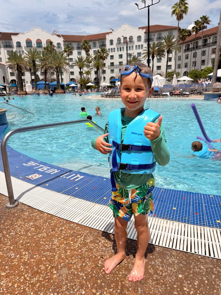 Birch in a life jacket at the Hard Rock pool